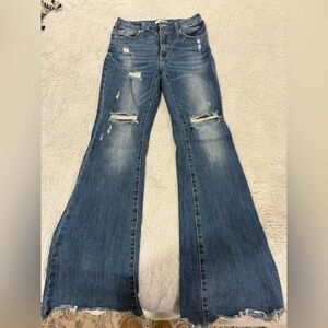 Classic Blue Flare Jeans with Distressed Details